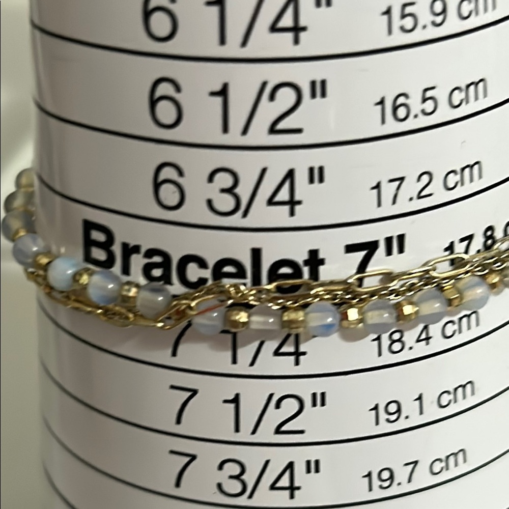 Elegant Gold Tone Iridescent Bead 3 Strand Adjustable Bracelet.